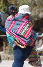 A Peruvian woman with her child