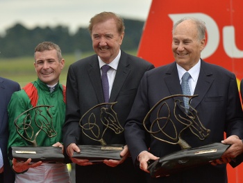 Kildare , Ireland - 25 June 2016; Jockey Pat Smullen with, from left, trainer Dermot Weld and owner H H Aga Khan after winning the Dubai Duty Free Irish Derby on Harzand at the Curragh Racecourse in the Curragh, Co. Kildare. (Photo By Cody Glenn/Sportsfile via Getty Images)