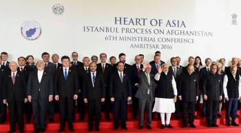 Sunday, Dec 4th, 2016 - Amritsar, India: Prime Minister Narendra Modi, along with Afghanistan's President Ashraf Ghani, Finance Minister Arun Jaitley, MoS for External Affairs V K Singh and other delegates, pose for a group photo before the inauguration of the 6th Heart of Asia Ministerial Conference. Mrs. Nurjehan Mawani, AKDN Resident Representative for Afghanistan, is seen standing at the back row, 5th person from the left. (PTI Photo by Kamal Kishore)